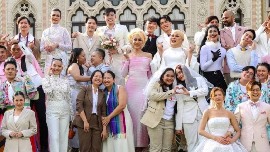 A group of LGBTQ pose for a picture as a part of celebration of a marriage equality bill at Government house in Bangkok, Thailand. (AP Photo)