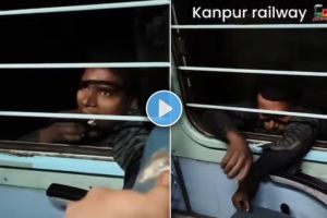 Thief calmly hangs from window of moving train in dangerous stunt