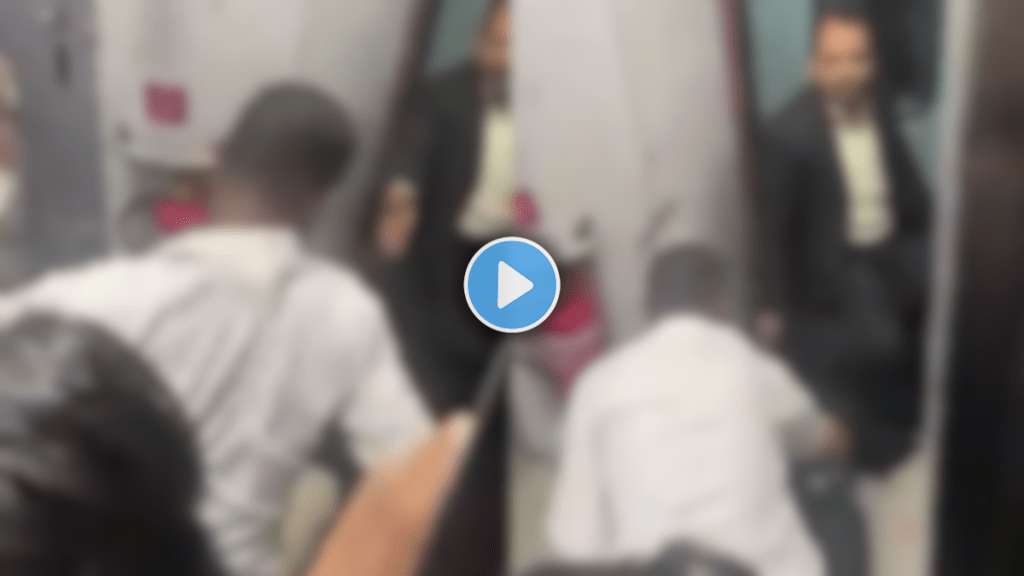 Viral Video Drunk Man Pinned Down By Ticket Checker Train Attendant Flogs Him