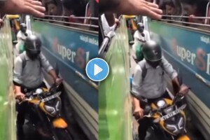 Viral video of Biker got stuck between two buses while overtaking stunt goes wrong