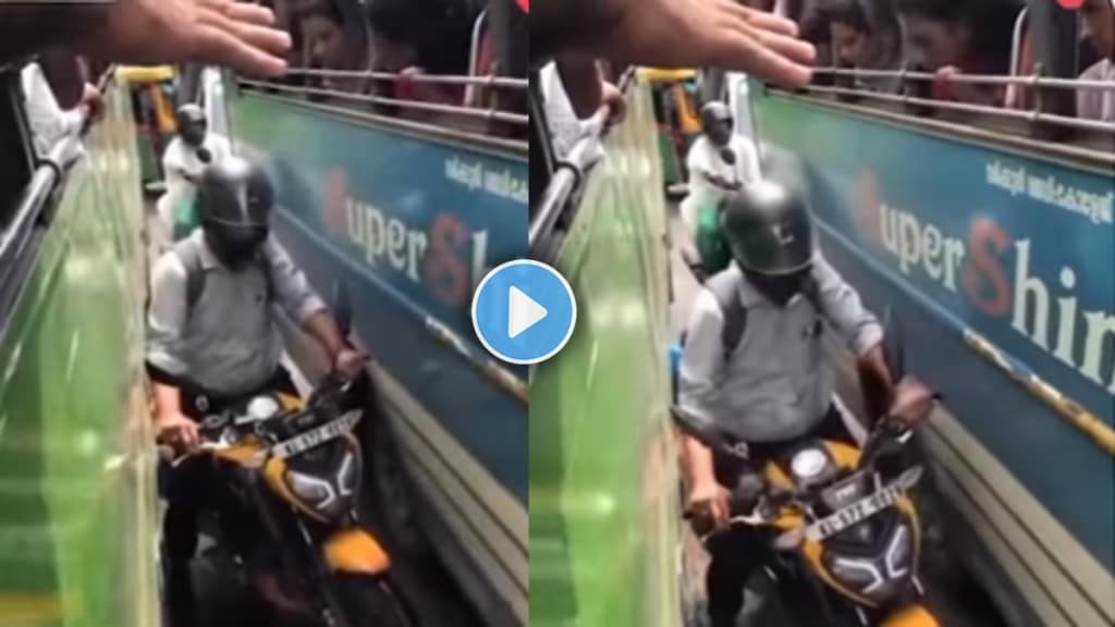 Viral video of Biker got stuck between two buses while overtaking stunt goes wrong