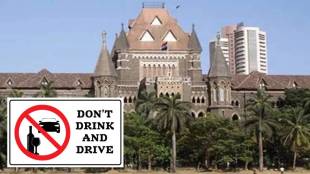 bombay high court orders to stand with dont drink and drive banner at traffic junction