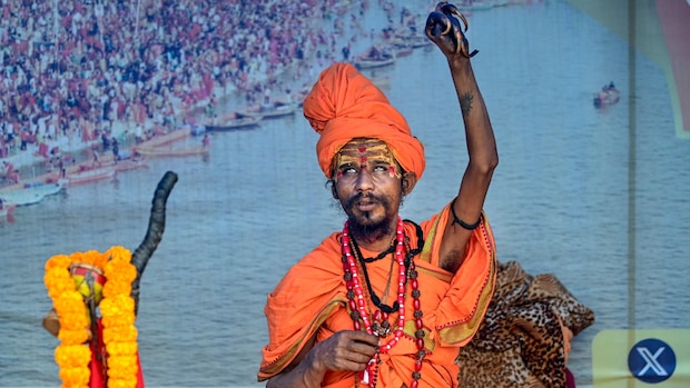 Prayagraj: Devotees take a holy dip at Sangam ahead of the Maha Kumbh Mela. (PTI Photo)