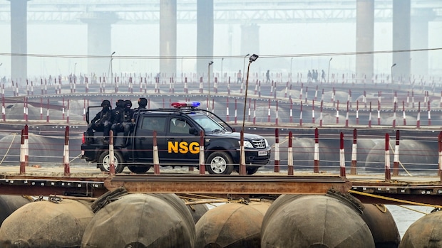 Prayagraj: NSG commandos patrol at Sangam ahead of the Maha Kumbh Mela. (PTI Photo)