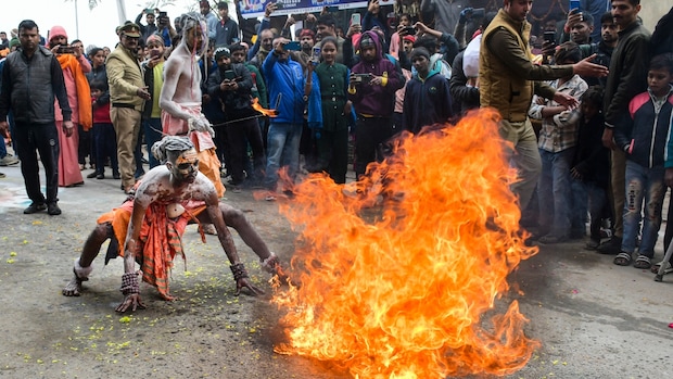 Prayagraj: Artists perform during the Chavni Pravesh by sadhus of Shree Mahanirvani Akhada, the royal entry procession for the Maha Kumbh Mela, at Sangam in Uttar Pradesh. (PTI Photo)