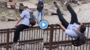 Terrifying video of man crossing railway track fell down from barricade accident video viral