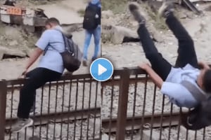 Terrifying video of man crossing railway track fell down from barricade accident video viral