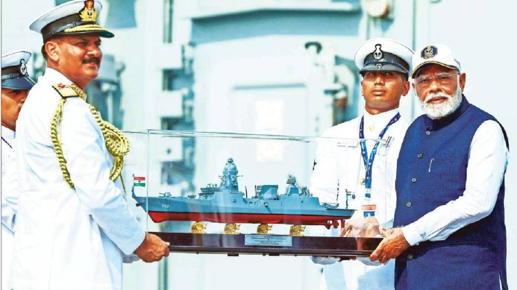 prime minister narendra modi dedicates two frontline naval warships and submarine to the nation