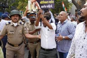 Protest against adani in kurla in the leadership of varsha gaikwad