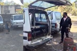 Two school vans of private school with same number plate