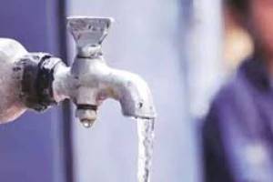 Which schools in Wardha district have water that is dangerous to drink