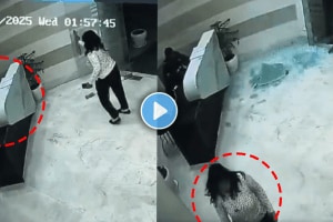 Woman breaks glass door of society after catching security guard sleeping on dusty in greater noida shocking video viral