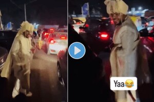 Groom walks through traffic to chase his Barat