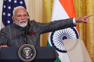 Prime Minister Narendra Modi addressing a question on Adani bribery charges during a press conference, emphasizing his commitment to every Indian.