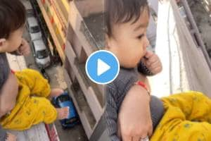 Mother making reels while holding baby in building open terrace shocking video goes viral