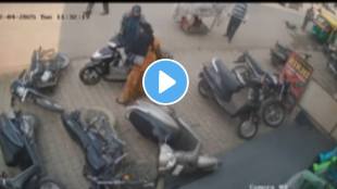 Girl fell down of scooty on road funny video goes viral on social media