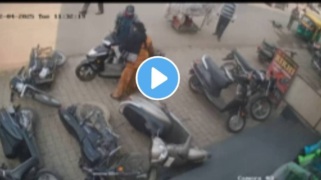 Girl fell down of scooty on road funny video goes viral on social media