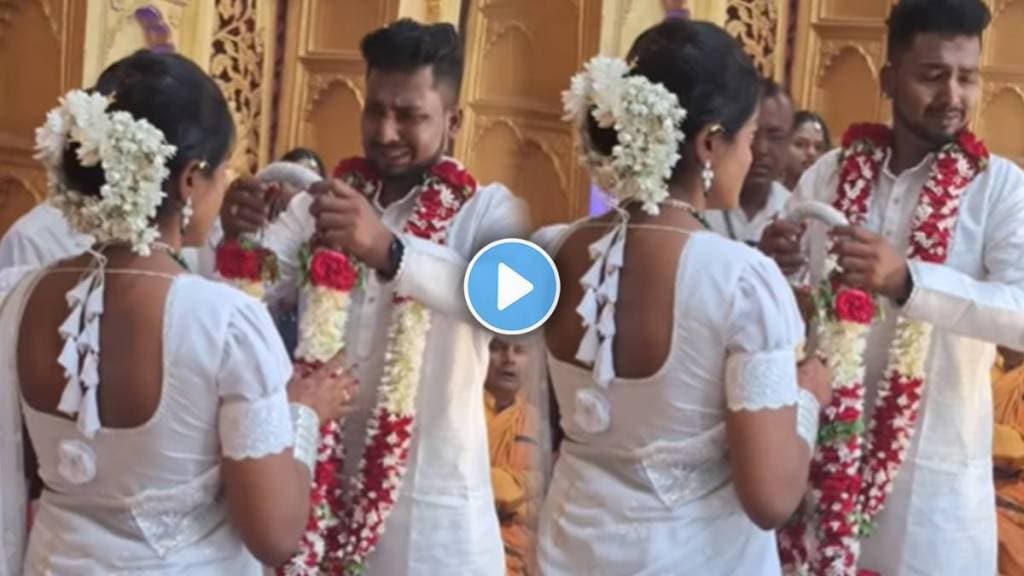 groom crying on varmala