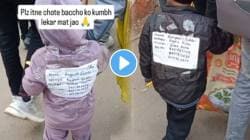 VIDEO: कुभंमेळ्यात लहान मुलं हरवू नये म्हणून पालकांनी केला भन्नाट जुगाड; कपड्यांवर लावलं असं पोस्टर की वाचून पोट धरुन हसाल