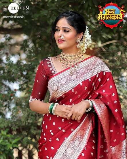 Akshaya Mahesh shares pictures in red saree on social media from the sets of Laxmi Niwaas