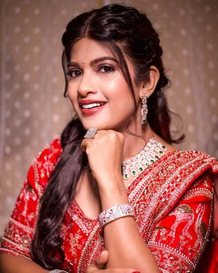 Dhanashri Kadgaonkar shares pictures in traditional red designer lehenga on social media