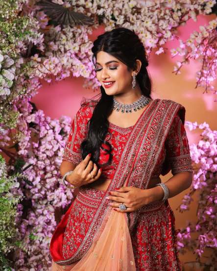 Dhanashri Kadgaonkar shares pictures in traditional red designer lehenga on social media 