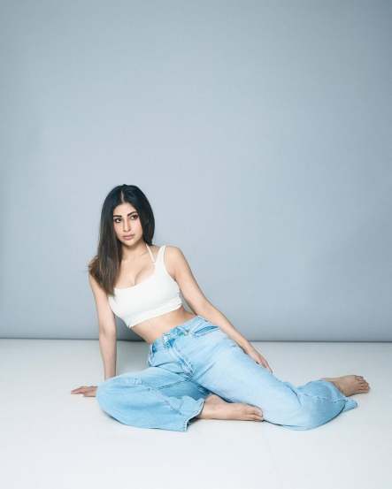 Mouni Roy Shares hot pictures in blue jeans and white tank top on social media post goes viral