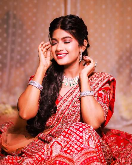 Dhanashri Kadgaonkar shares pictures in traditional red designer lehenga on social media 