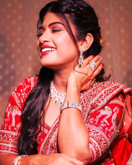 Dhanashri Kadgaonkar shares alluring pictures in traditional red designer lehenga on social media 