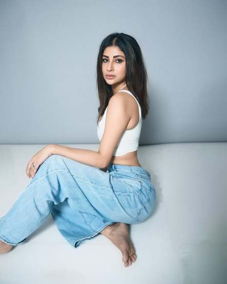 Mouni Roy Shares hot pictures in blue jeans and white tank top on social media post goes viral