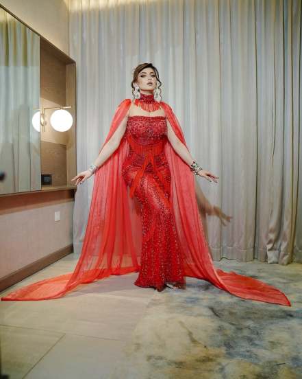 Urvashi Rautela shares pictures in Red Designer Gown on social media