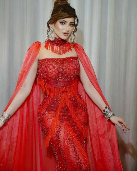 Urvashi Rautela shares pictures in Red Designer Gown on social media