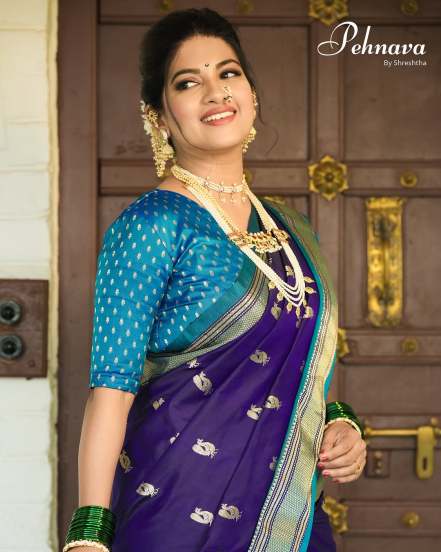 Dhanashri Kadgaonkar shares pictures in violet paithani saree on social media on the occasion of Shivaji Jayanti