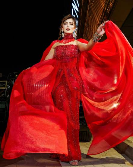 Urvashi Rautela shares pictures in Red Designer Gown on social media