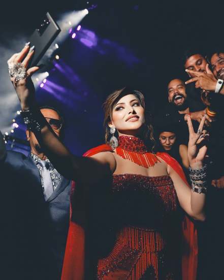 Urvashi Rautela shares pictures in Red Designer Gown on social media