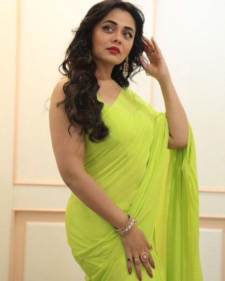 Prarthana Behere poses in traditional yellow saree for the promotions of her upcoming movie Chiki Chiki BooBoom Boom