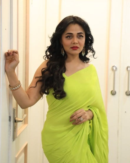 Prarthana Behere poses in traditional yellow saree for the promotions of her upcoming movie Chiki Chiki BooBoom Boom