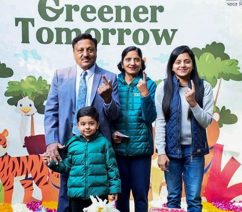 Chief Election Commissioner Rajiv Kumar, along with his family, showed off their inked fingers after voting in Delhi. (PTI Photo)