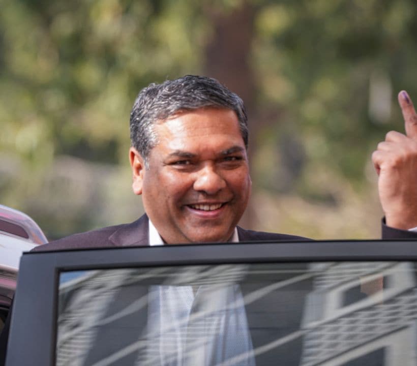 Chief Justice of India Sanjiv Khanna shows his finger marked with indelible ink after casting his vote at a polling booth. (PTI Photo)