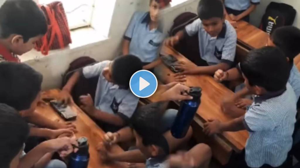 students play dhol tasha beat on classroom bench