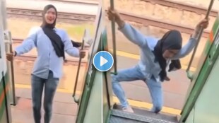 Shocking video of young girl standing outside of train door doing stunt for reel viral video on social media