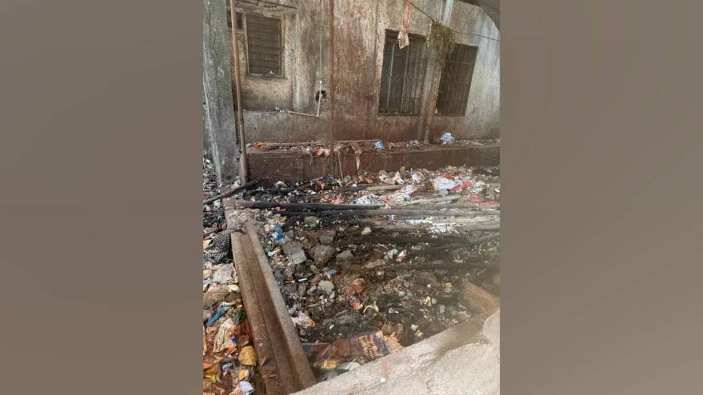 Due to lack of maintenance garbage have accumulated in Kalyan dombivli municipal Corporation buildings backyard