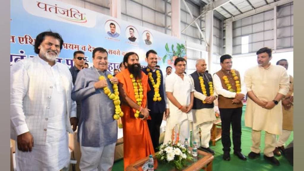 patanjalis stalled orange processing plant was inaugurated in nagpur on sunday by fadanvis nitin gadkari and ramdev baba