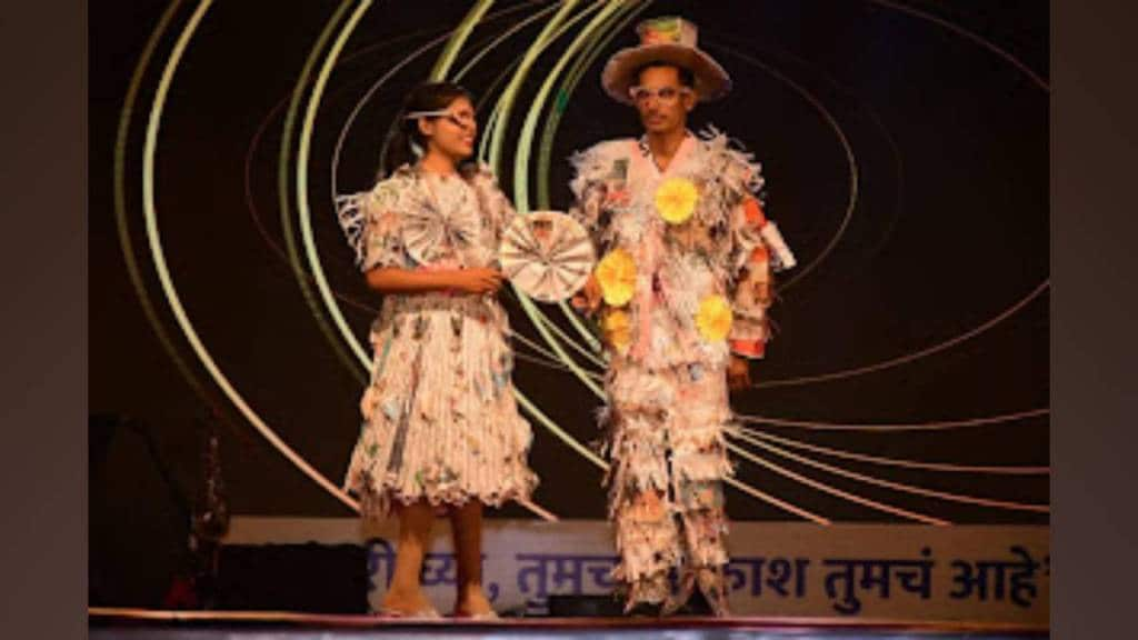 fashion show at women entrepreneurs meet featured young women in newspaper outfits