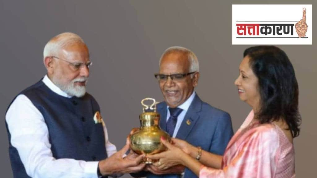 Prime Minister Narendra Modi gifts 'Gangajal' from Maha Kumbh to Mauritius President Dharam Gokhool during a meeting, in Mauritius