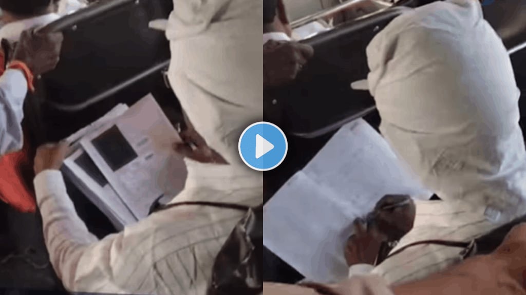 Teacher checking 12th paper hsc board exam papers in bus shocking video viral on social media