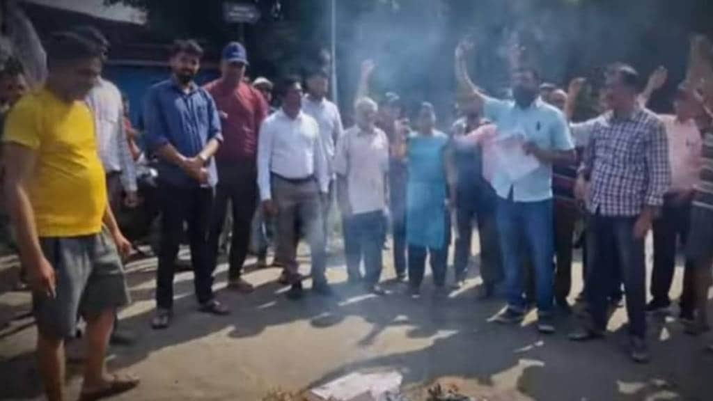 Villagers aggressive due to reservation of waste land and sewage project Protest movement by burning reservation papers in Gas village