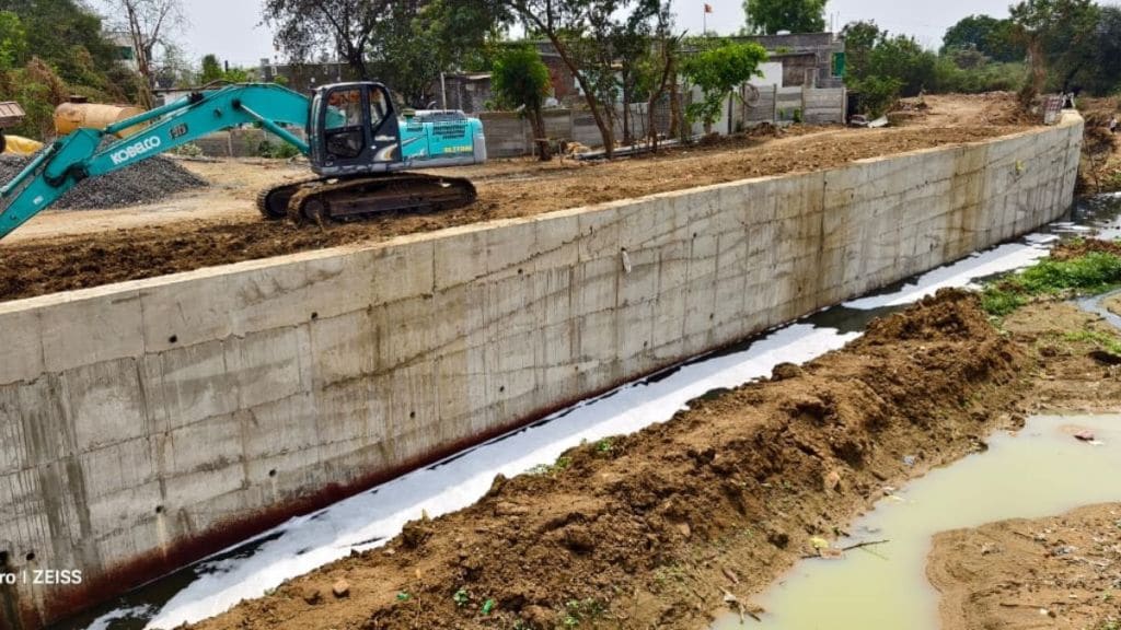 BJP MLA built wall in drain for his own plot using government funds