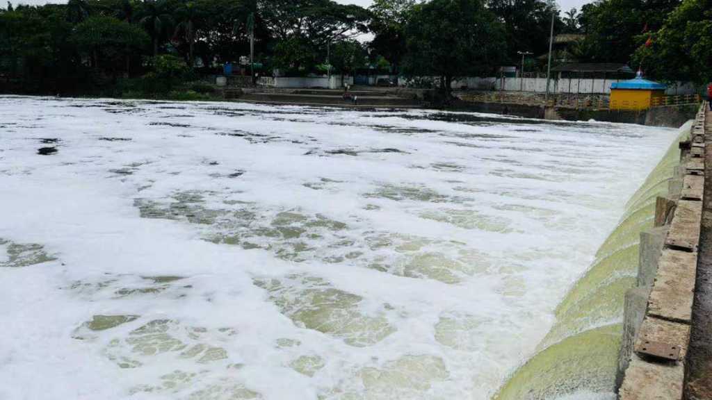 sugar factories discharge polluted water into river