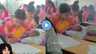 Mother Brings Child to Exam Centre